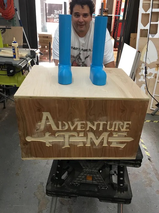 Mid-build assembly stage showing BMO's wooden frame coming together
