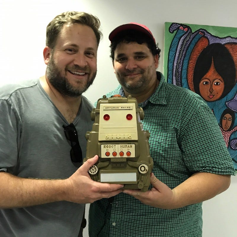 Mario and collaborator with Optimus Rhyme robot