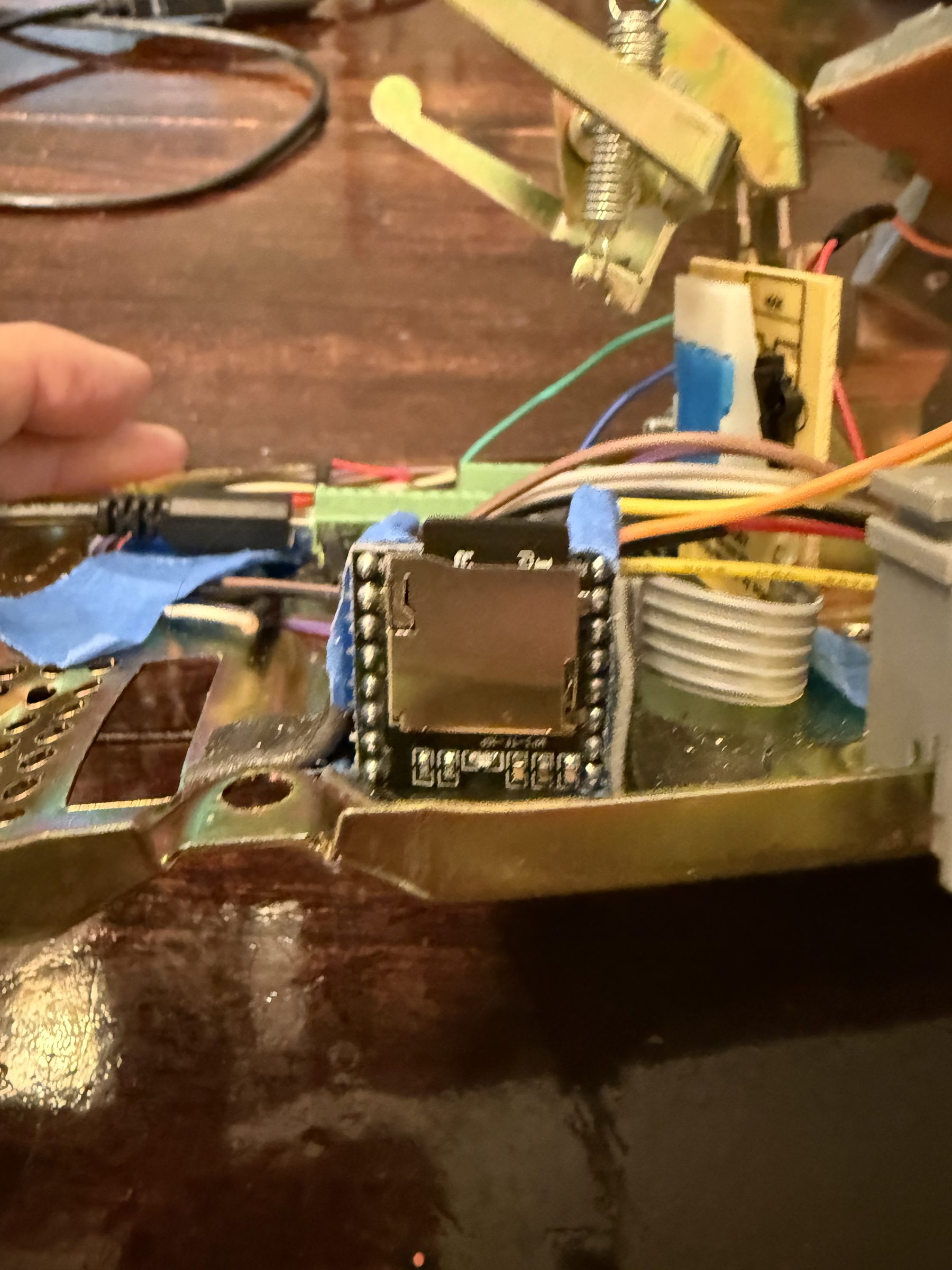 DFPlayer Mini with SD card slot mounted inside the phone